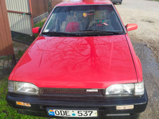 Mazda 323 foto 1