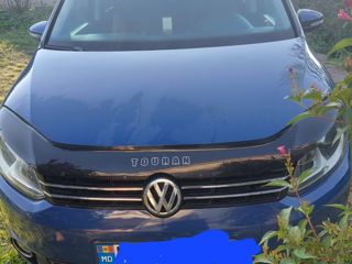 Volkswagen Touran foto 1