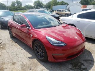 Tesla Model 3 foto 1