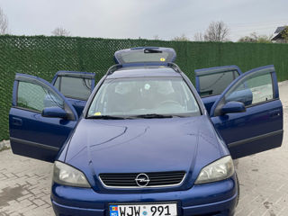 Opel Astra фото 7