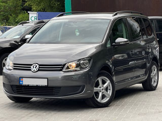 Volkswagen Touran foto 1