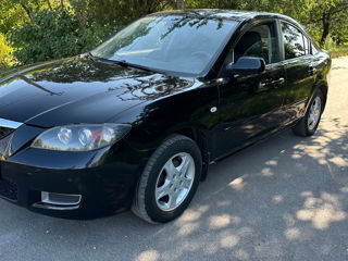 Mazda 3 foto 1