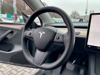 Tesla Model Y foto 11