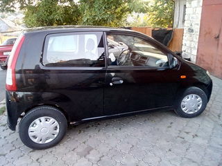 Daihatsu Cuore foto 1