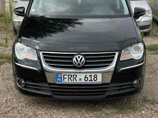 Volkswagen Touran foto 1