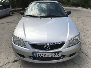 Mazda 323 foto 1