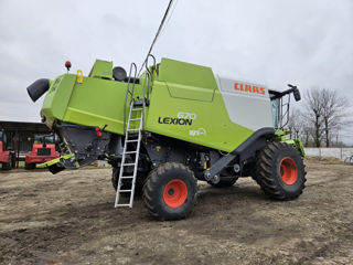 Terra Class vinde combină Claas Lexion 670 4X4 Montana din 2014 foto 9