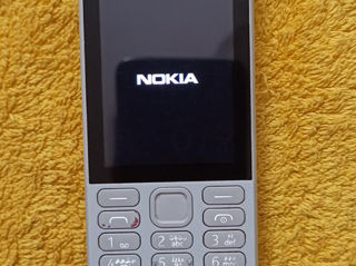 Nokia кнопочный 2-sim с зарядкой за 470 лей