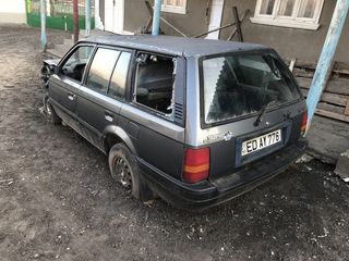 Mazda 323 foto 1