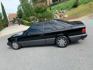 Mercedes Series (W124) foto 1