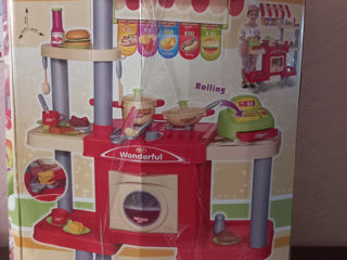 Продаю детскую игрушечную кухню с посудой , foto 2