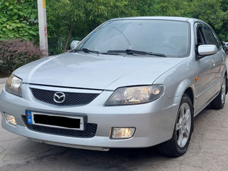 Mazda 323 foto 1