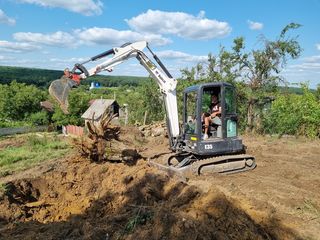 Curatarea terenurilor,indreptarea lor,servicii de terasament foto 3