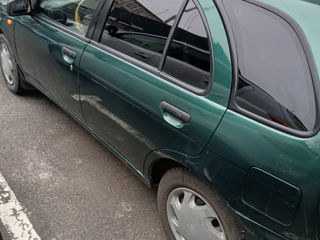 Nissan Almera foto 9