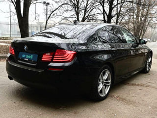 BMW 5 Series foto 4