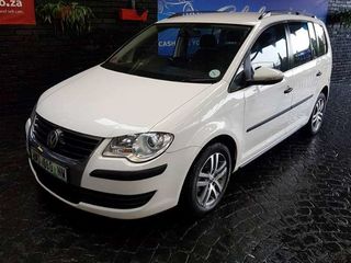 Volkswagen Touran foto 1