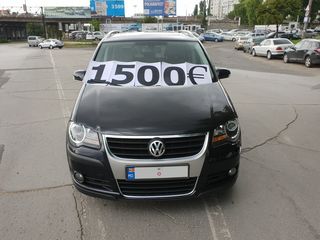 Volkswagen Touran foto 1