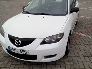 Mazda 3 foto 1