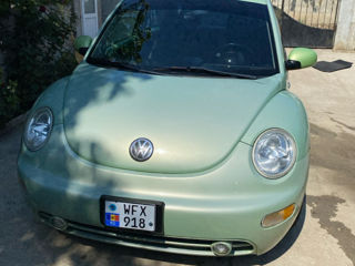 Volkswagen New Beetle foto 1