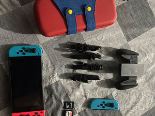 Vând Nintendo switch original cu jocuri foto 1