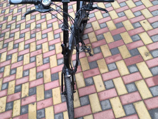 Bicicletă electrică foto 2