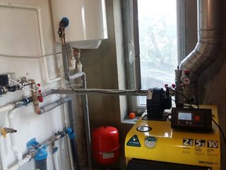 Instalarea sistemului de încălzire( podele calde, cazane, radiatoare, coșuri de fum) foto 2