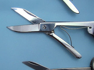 We change the spring of scissors on the Victorinox knives all types.