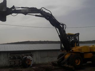 S c h i m b - м е н я ю excavator mecalac 14 mxt foto 7