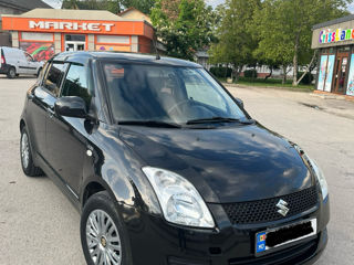 Suzuki Swift фото 0