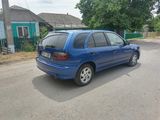 Nissan Almera foto 1