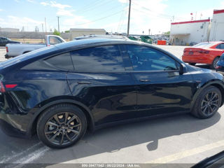 Tesla Model Y foto 2