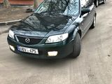 Mazda 323 foto 1