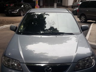 Mazda 323 foto 1