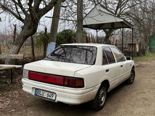 Mazda 323 foto 2