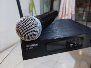 QLXD4 microfon fără fir  microfonul funcționează bine are un sunet foarte bun cine cunoaste știe