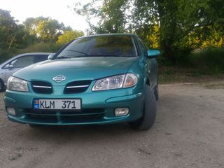 Nissan Almera foto 1