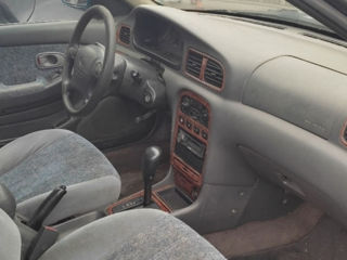 KIA Clarus фото 5