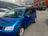 Volkswagen Touran foto 1