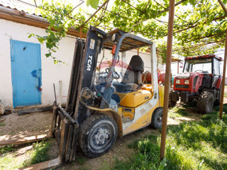 Livadă de prune cu uscătorie si tehnică agricolă foto 16