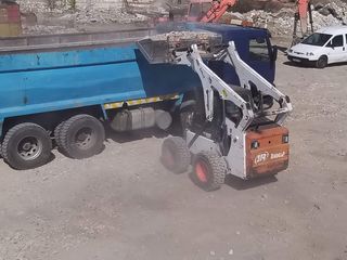 Bobcat cu demolator Бобкэт с гидромолота foto 3