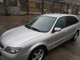 Mazda 323 foto 1