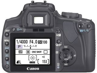Зеркальный японский полупрофессиональный фотоаппарат Canon foto 2