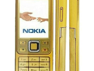 Мобильный телефон Nokia 6300-Gold-Edition-Новый с блоком зарядки в комплекте.