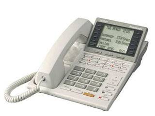 Цифровые и аналоговые системные телефоны для АТС foto 2