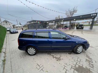 Opel Astra фото 2