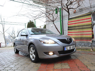 Mazda 3 foto 1