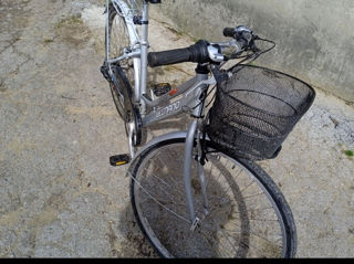 Se vinde urgent o bicicletă în stare excelenta foto 2