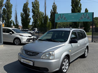 KIA Carens фото 0