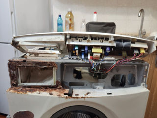 Reparatia msinilor de spalat si masinilor de uscat rufe foto 4