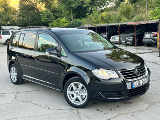 Volkswagen Touran foto 1